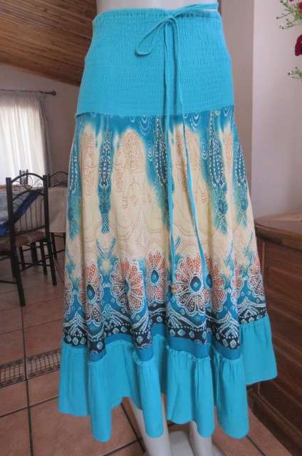 Bohemian style wide elasticated yoke skirt with cream/turquoise border size 34/10 by Meiling`.As new