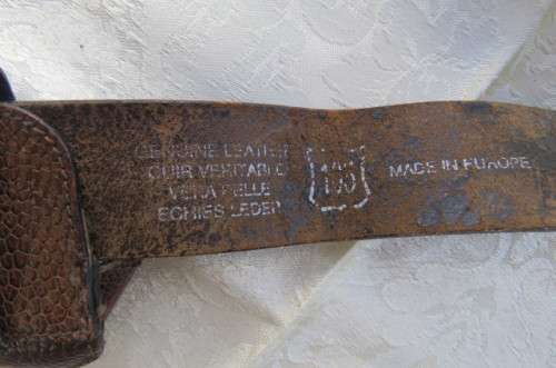 Genuine leather brown belt with holder. Length 108 cm. Made in Europe. Used but in good condition.