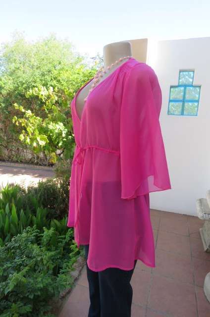 Beautiful long sheer polyester hot pink top  with bell sleeves. Size 40/16 by FU. Tiestring in waist