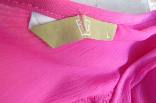 Beautiful long sheer polyester hot pink top  with bell sleeves. Size 40/16 by FU. Tiestring in waist