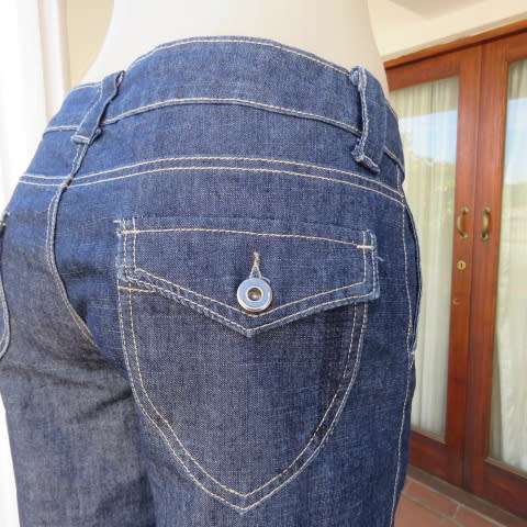 Low rise cropped denim jean pants with culotte look. Wide legs. Size 34/10. New condition.