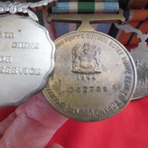 Set of 4 SADF medals with ribbons. General Service...Bronz 1994 service..Silver good service..5yr