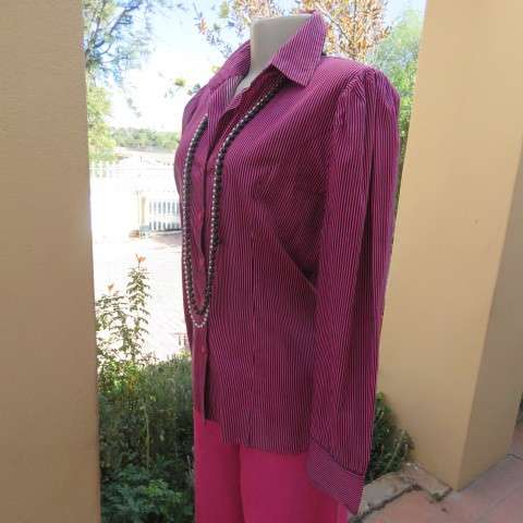 Pretty styled long sleeve blouse in magenta pink and black vertical stripes. By RT in size 38/14