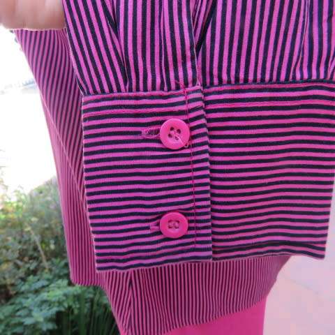 Pretty styled long sleeve blouse in magenta pink and black vertical stripes. By RT in size 38/14