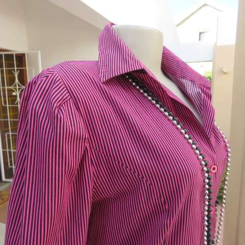 Pretty styled long sleeve blouse in magenta pink and black vertical stripes. By RT in size 38/14