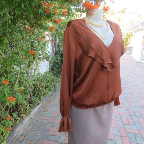 Soft draping golden brown slip over top by 'Oasis' in size 38/14. Blouson style. Double frilled.