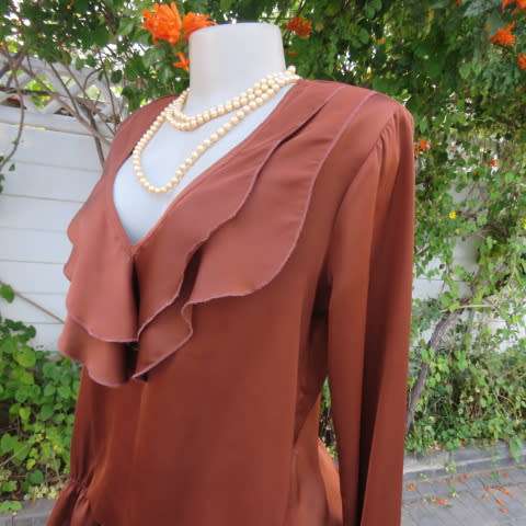 Soft draping golden brown slip over top by 'Oasis' in size 38/14. Blouson style. Double frilled.
