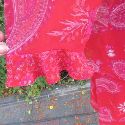 Wear anywhere 2 piece outfit in red sheer polyester with paisley and floral pattern.Size 40/16.