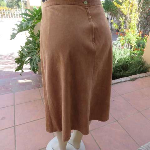 Smart A-Line calf length suede look camel skirt with seam at back and front. Zip at back.Size 42/18