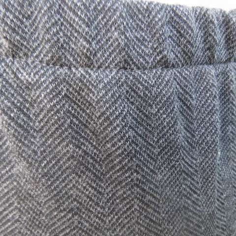 Versatile A-line skirt in grey vertical pattern in jersey. Flat front.Elasticated back.Size 42/18