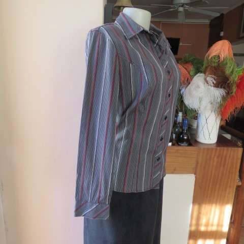 Power print top in red,black and white by FASHION EXPRESS in size 36/12. Button down.New cond.