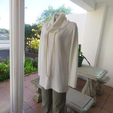 Soft cream colour long pull over cardigan with cowl neckline. In 100% acrylic yarn. Size 38 to 40