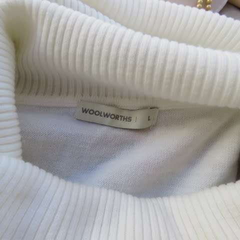 Soft cream colour long pull over cardigan with cowl neckline. In 100% acrylic yarn. Size 38 to 40