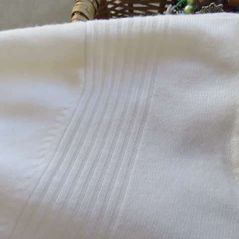 Soft cream colour long pull over cardigan with cowl neckline. In 100% acrylic yarn. Size 38 to 40