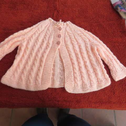 New hand knitted baby jacket.Knitted with acrylic yarn.Small cable pattern.3 to 6months Long sleeves