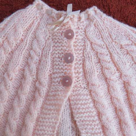 New hand knitted baby jacket.Knitted with acrylic yarn.Small cable pattern.3 to 6months Long sleeves