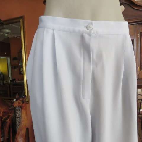 Best quality RAOUL pant suite in size 40 to 42. Pale blue colour. In 100% polyester fabric. New cond