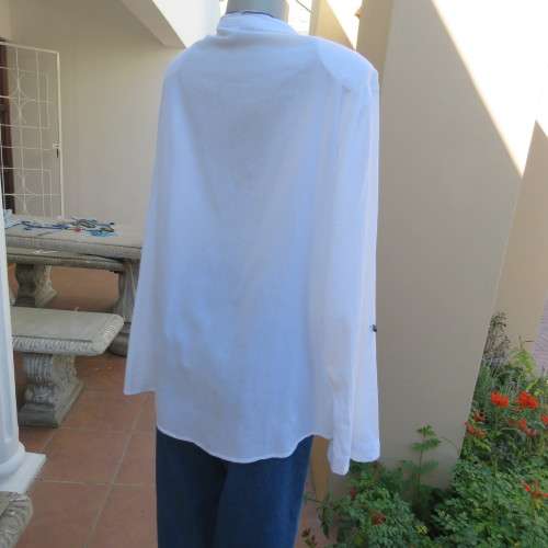Oversized white cotton long top with button down front and decorated bib.Size 50/26. New condition