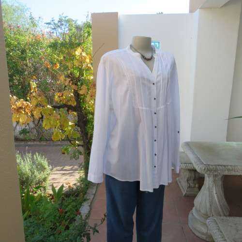 Oversized white cotton long top with button down front and decorated bib.Size 50/26. New condition