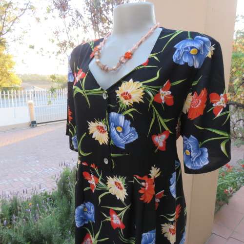 Cheerful 90's black viscose empire style dress with blue,orange and yellow flowers. size 42/18.