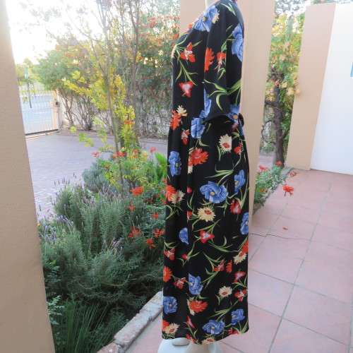 Cheerful 90's black viscose empire style dress with blue,orange and yellow flowers. size 42/18.