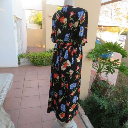 Cheerful 90's black viscose empire style dress with blue,orange and yellow flowers. size 42/18.