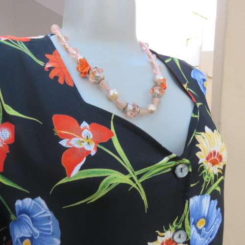 Cheerful 90's black viscose empire style dress with blue,orange and yellow flowers. size 42/18.