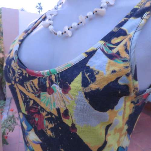 Sleek bodycon maxi dress in boho style colourful patterns.Size 34/10.Perfect fit.Scooped neckline.