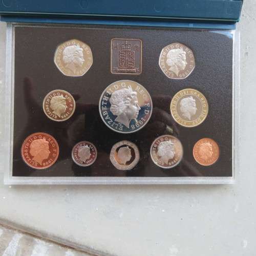 United Kingdom proof coin collection of 11 coins from 1998 in box with full details.