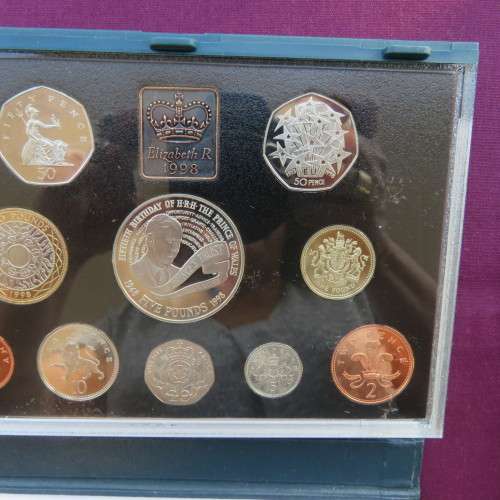 United Kingdom proof coin collection of 11 coins from 1998 in box with full details.