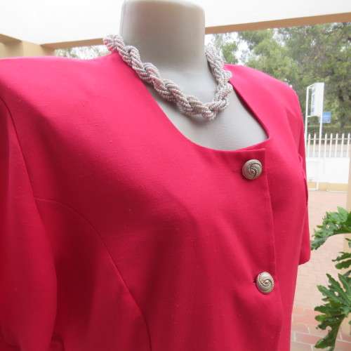 Elegant candy red short sleeve summer jacket. Collarless. Size 40/16 by `Merien Hall`. As new.