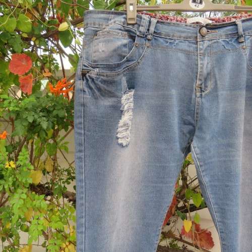 Sexy skinny leg blue denim jeans in size 48/24 by Curve INSYNC. Distressed look As new.