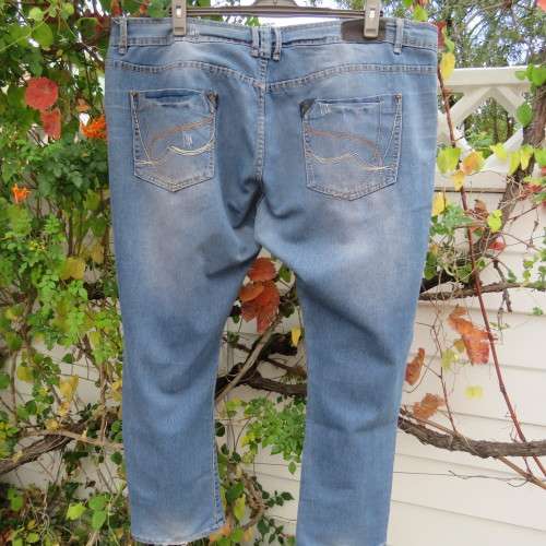 Sexy skinny leg blue denim jeans in size 48/24 by Curve INSYNC. Distressed look As new.