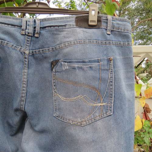 Sexy skinny leg blue denim jeans in size 48/24 by Curve INSYNC. Distressed look As new.