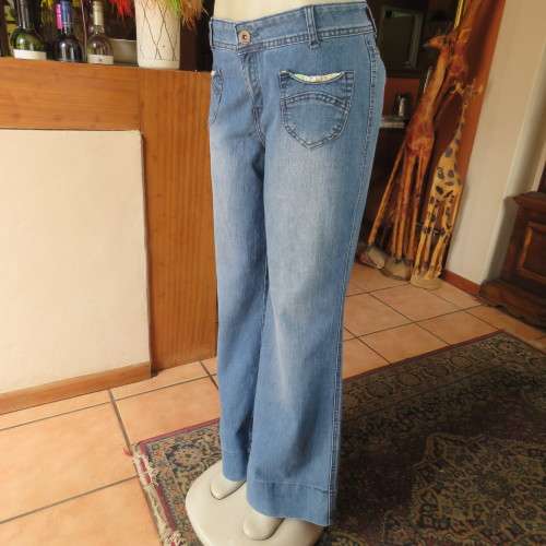 Wide legged blue denim jeans in size 38/14. Cute front pockets.In stretch polycotton. As new