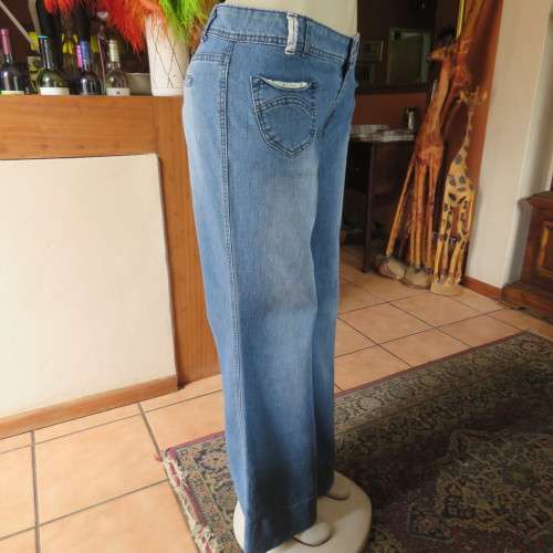 Wide legged blue denim jeans in size 38/14. Cute front pockets.In stretch polycotton. As new