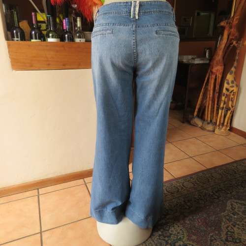Wide legged blue denim jeans in size 38/14. Cute front pockets.In stretch polycotton. As new