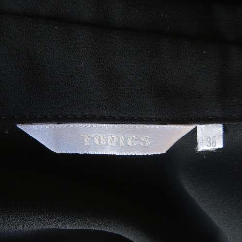 Black sheer polyester long sleeve top with button down front and open collar. Size 36/12 by TOPICS.