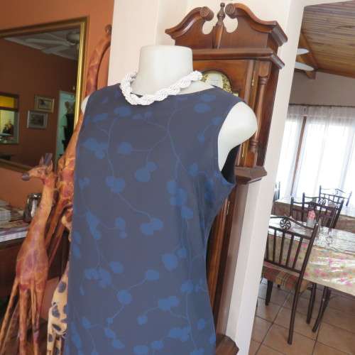 Stunning sleek maxi dress in 2 layers. Sleeveless with round neckline size 36/12. As new.