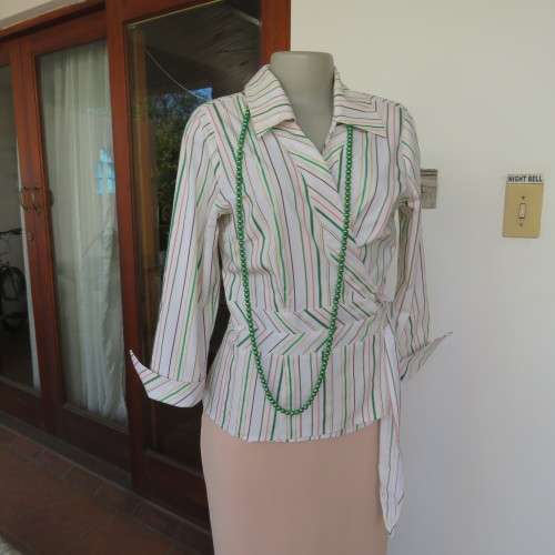 Smart embossed striped cross over top. Size 38/14 by INWEAR Long cuffed sleeves. New condition.