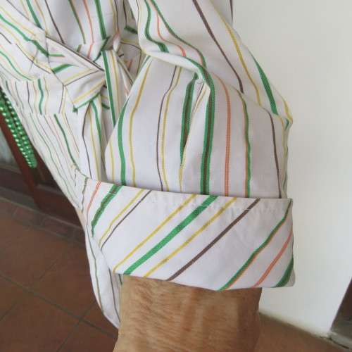 Smart embossed striped cross over top. Size 38/14 by INWEAR Long cuffed sleeves. New condition.