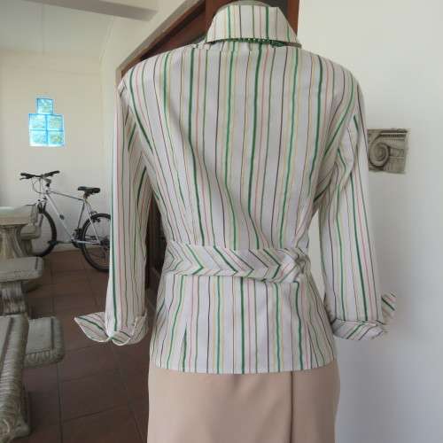 Smart embossed striped cross over top. Size 38/14 by INWEAR Long cuffed sleeves. New condition.