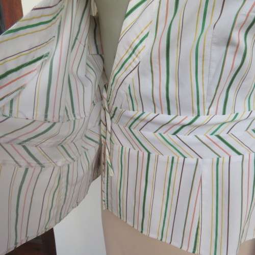 Smart embossed striped cross over top. Size 38/14 by INWEAR Long cuffed sleeves. New condition.