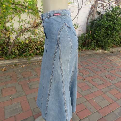 Up style size 32/8 blue denim high waisted A-line paneled skirt by `HANG TEN`. Very good condition.