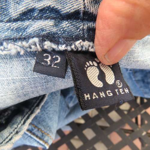 Up style size 32/8 blue denim high waisted A-line paneled skirt by `HANG TEN`. Very good condition.