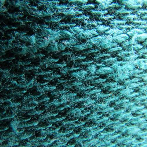 Textured teal colour open hanging sleeveless top in size 38/14. With pleats on front. As new.