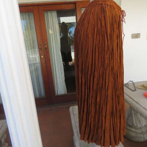GO-EAST permanent crinkled colden brown maxi skirt from India for size 36 to 36. As new.