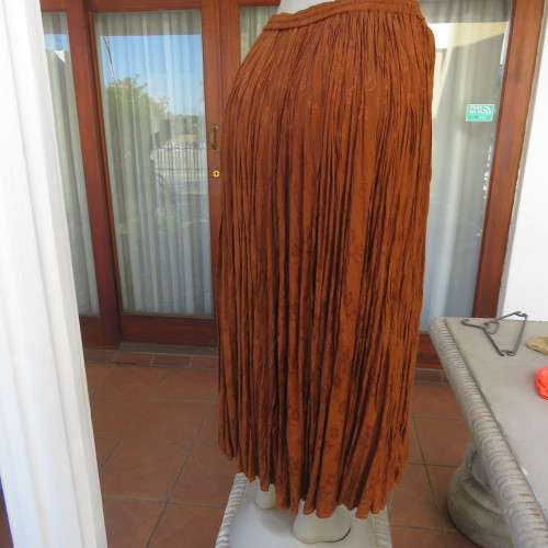 GO-EAST permanent crinkled colden brown maxi skirt from India for size 36 to 36. As new.
