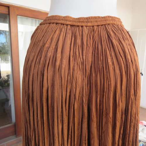 GO-EAST permanent crinkled colden brown maxi skirt from India for size 36 to 36. As new.