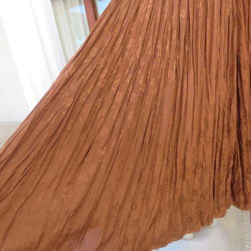 GO-EAST permanent crinkled colden brown maxi skirt from India for size 36 to 36. As new.
